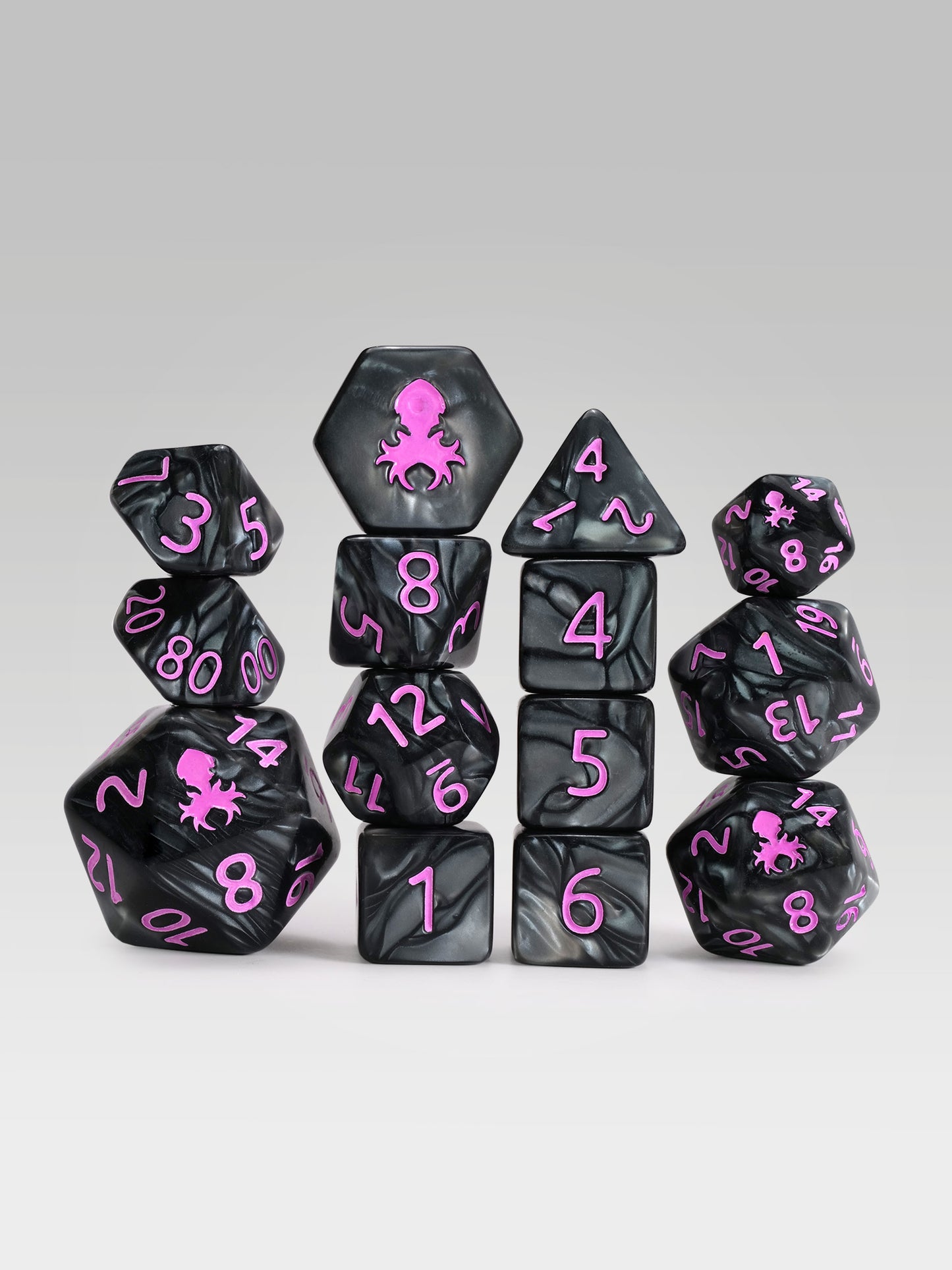 Kraken's Signature Black 14pc Dice Set inked in Pink