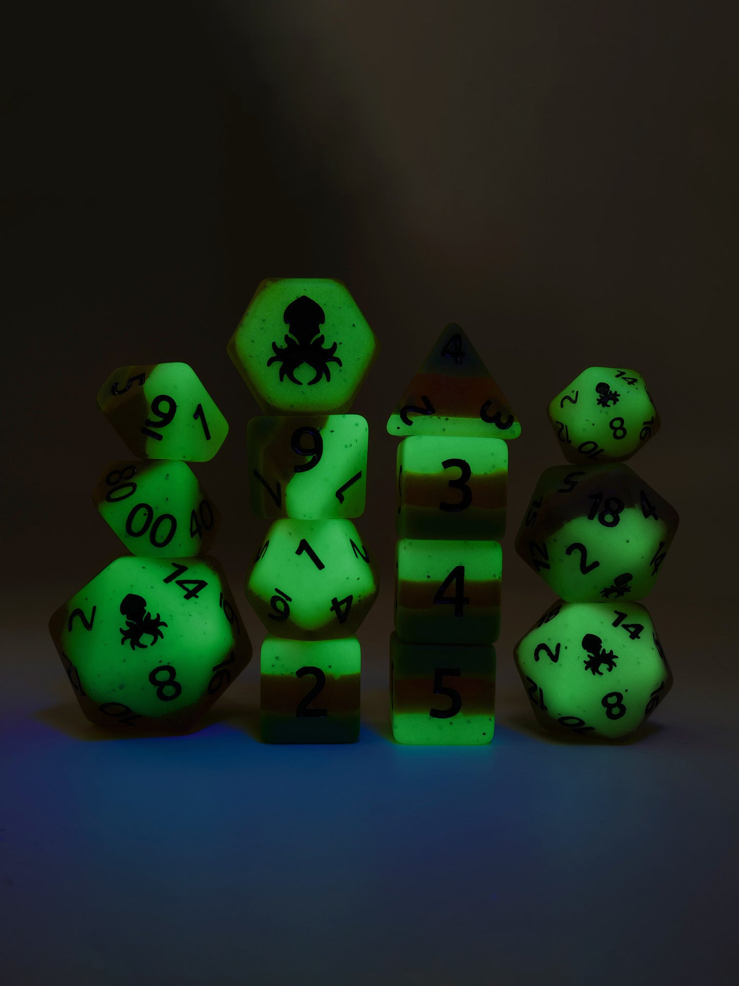 Papaya Glow in the Dark 14pc Dice Set inked in Black