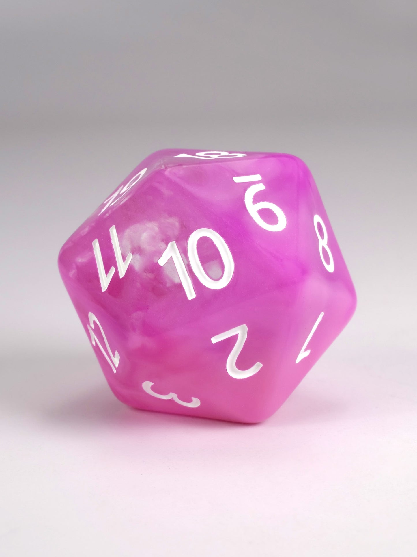 Sea Maiden d20 spindown life counter for MTG Pink polyhedral dice with white numbers on a light gray background