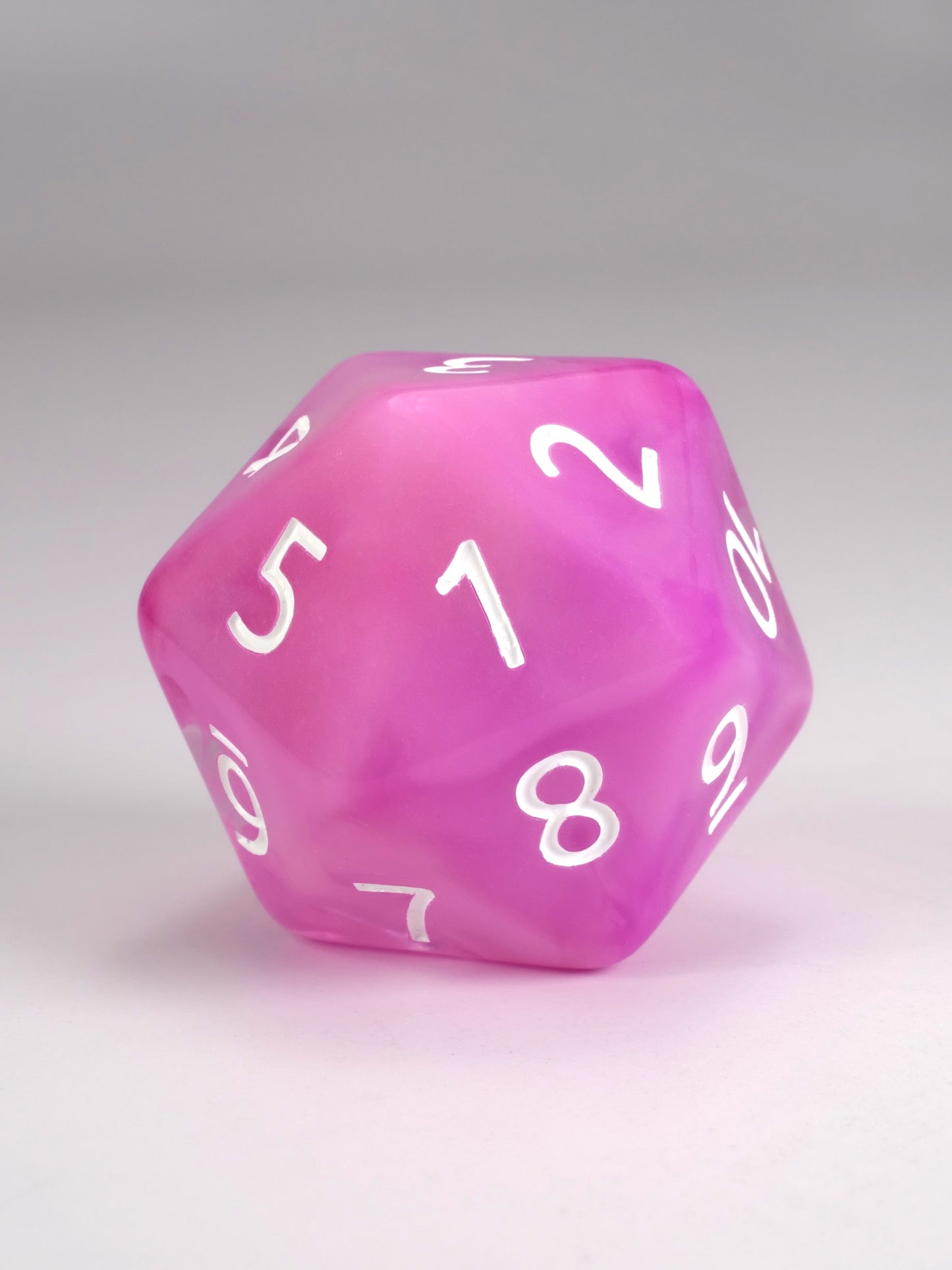 Pink polyhedral dice with white numbers on a gray background Sea Maiden d20 spindown life counter for MTG