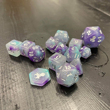 Quantum Heat Reactive 14pc Dice Set for TTRPGs inked in Silver