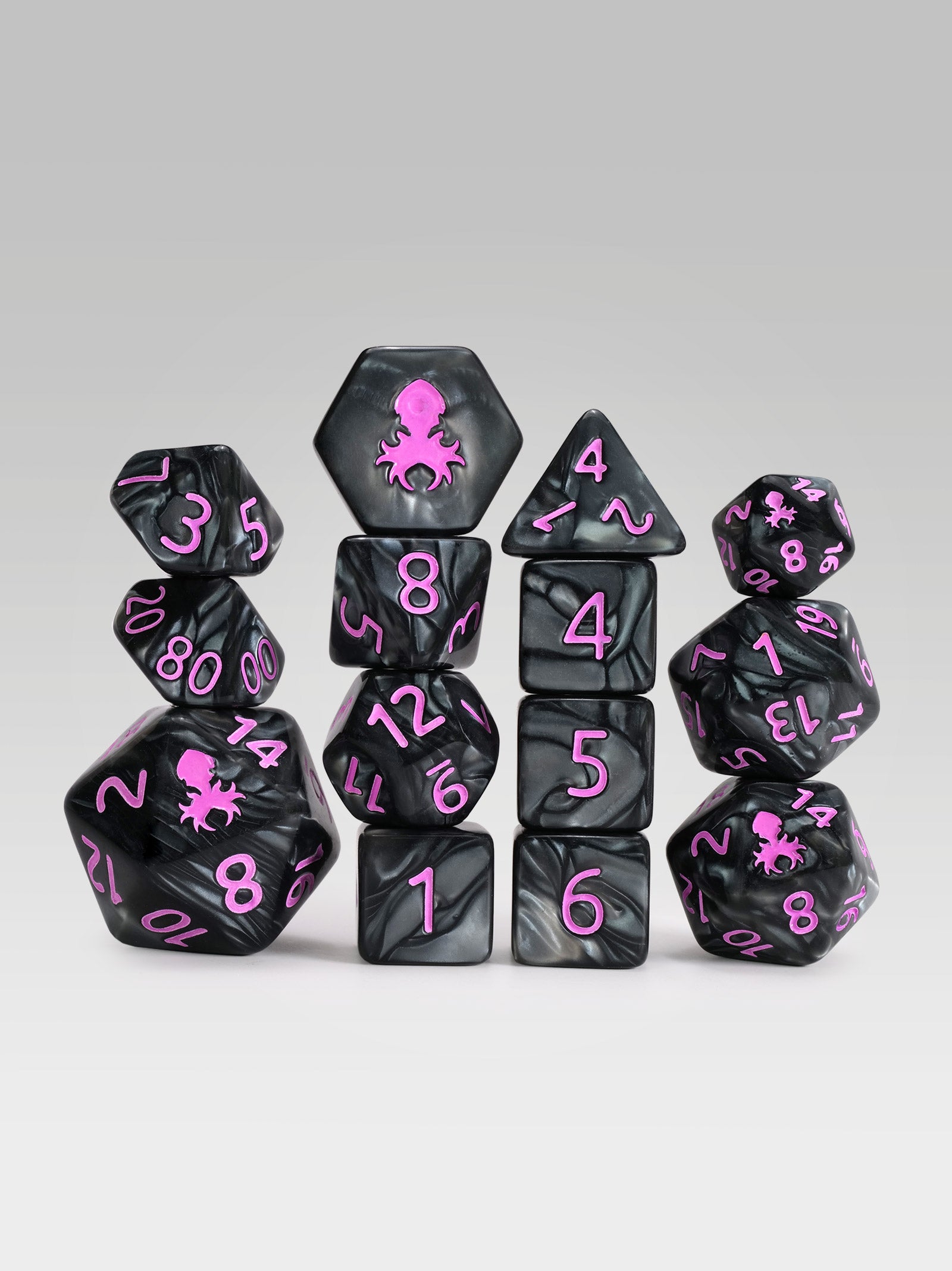 Kraken's Signature Black 14pc Dice Set inked in Pink