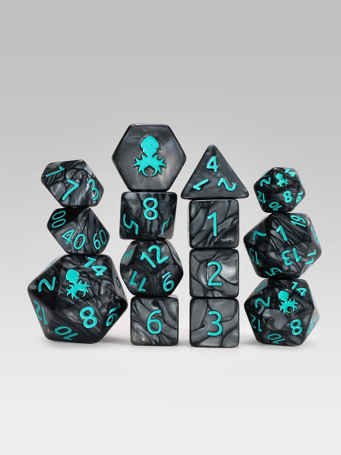 Kraken's Signature Black 14pc Dice Set inked in Teal