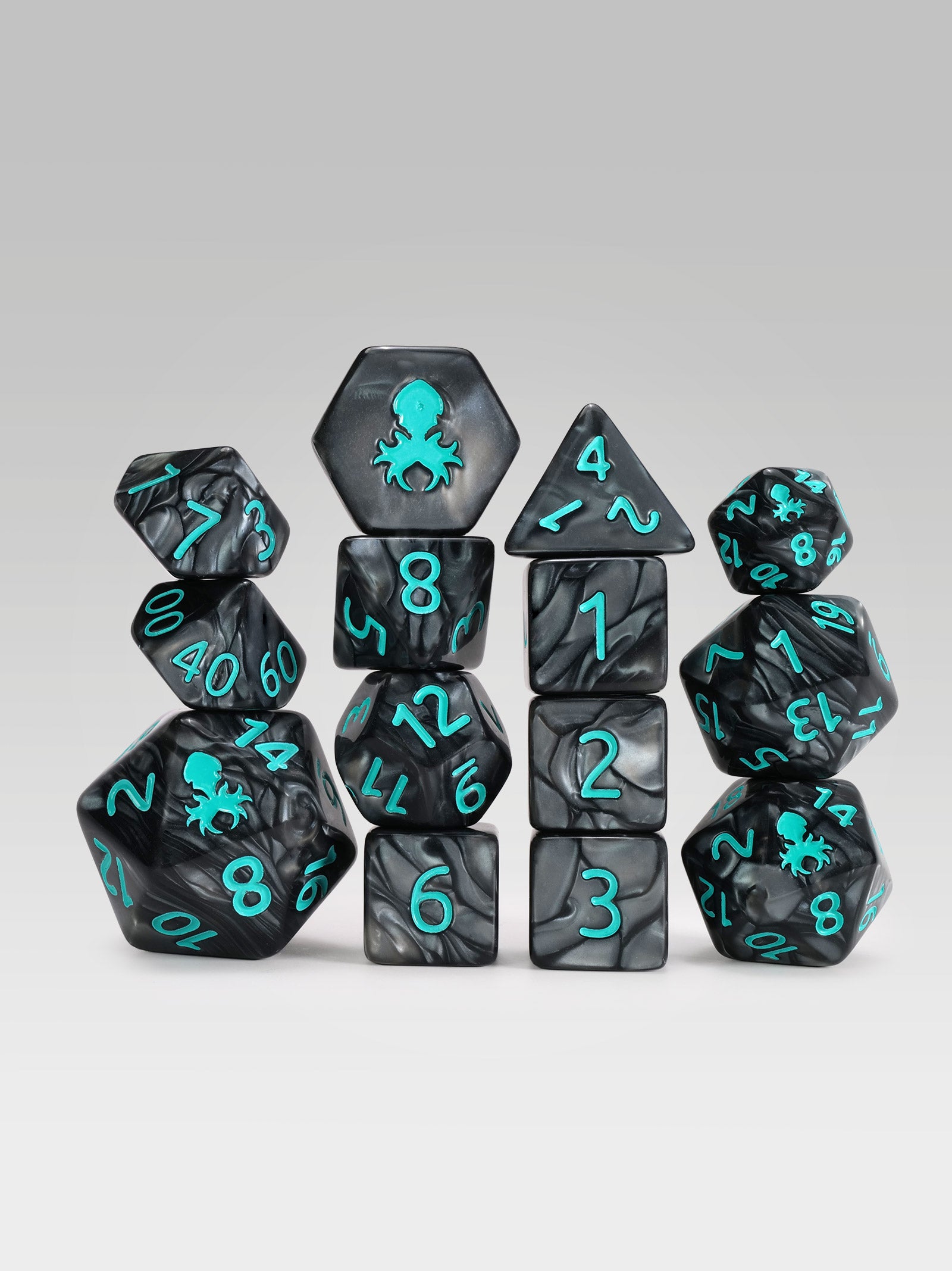 Kraken's Signature Black 14pc Dice Set inked in Teal
