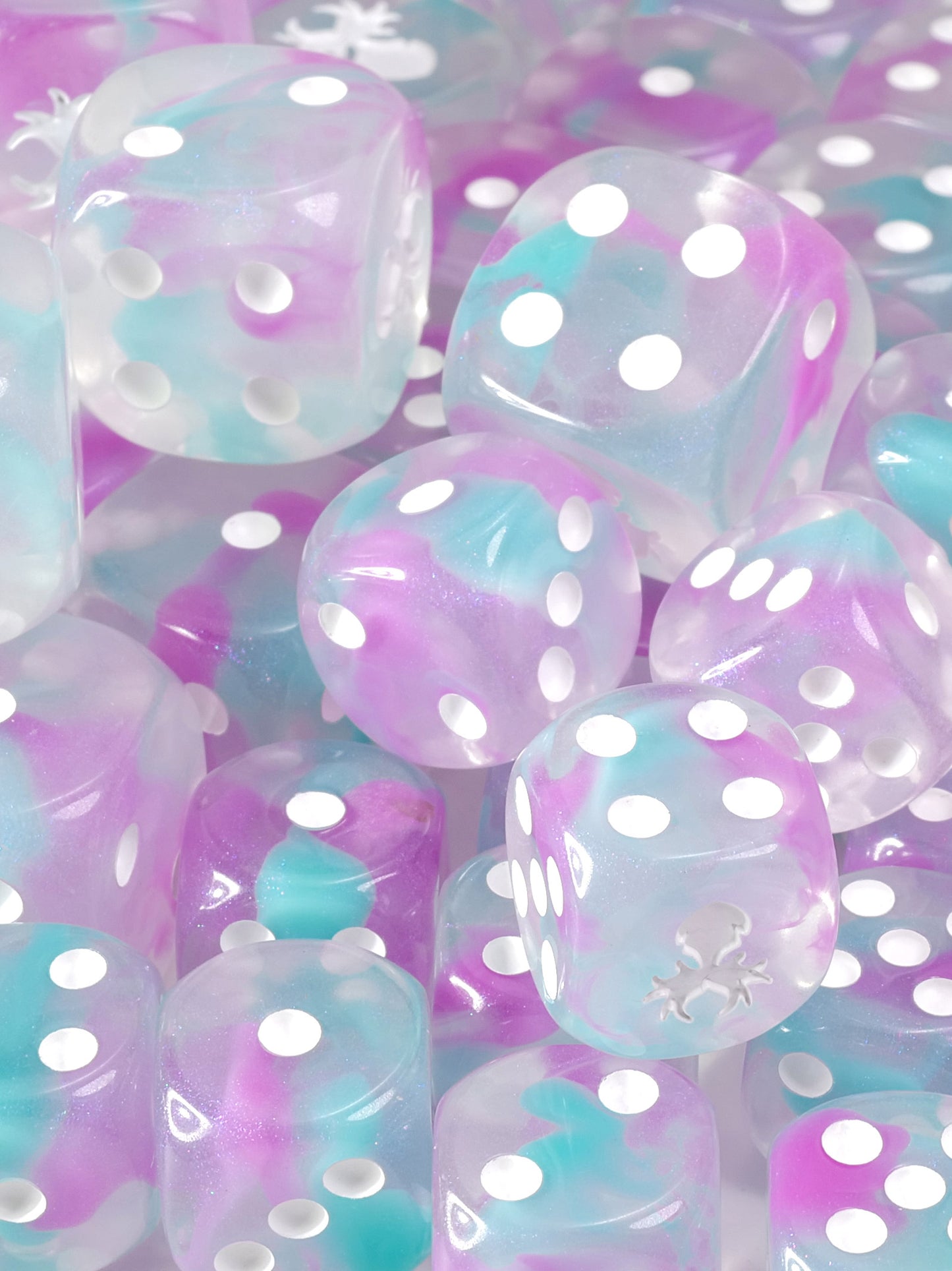 Clear dice with white polka dots in pastel colors