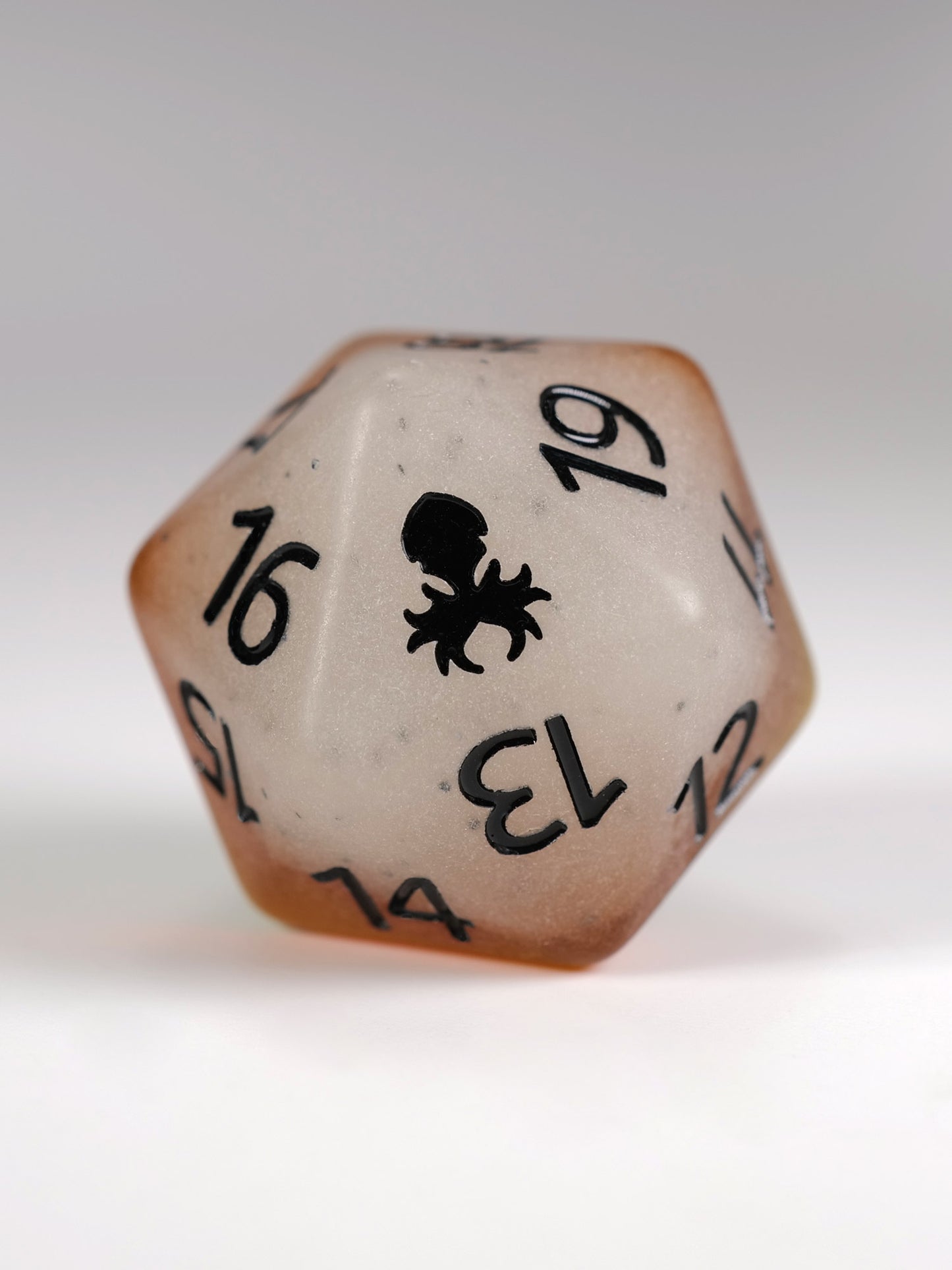 Papaya Glow in the Dark Spindown D20