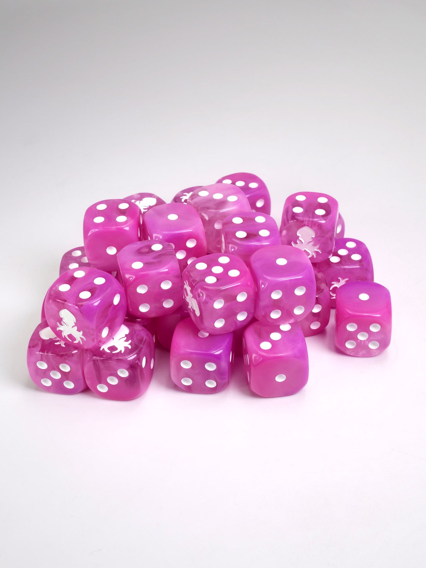 Pink dice d6 pips with rounded corners with white Kraken Dice logo Wargaming Resin Dice for War hammer type war games.