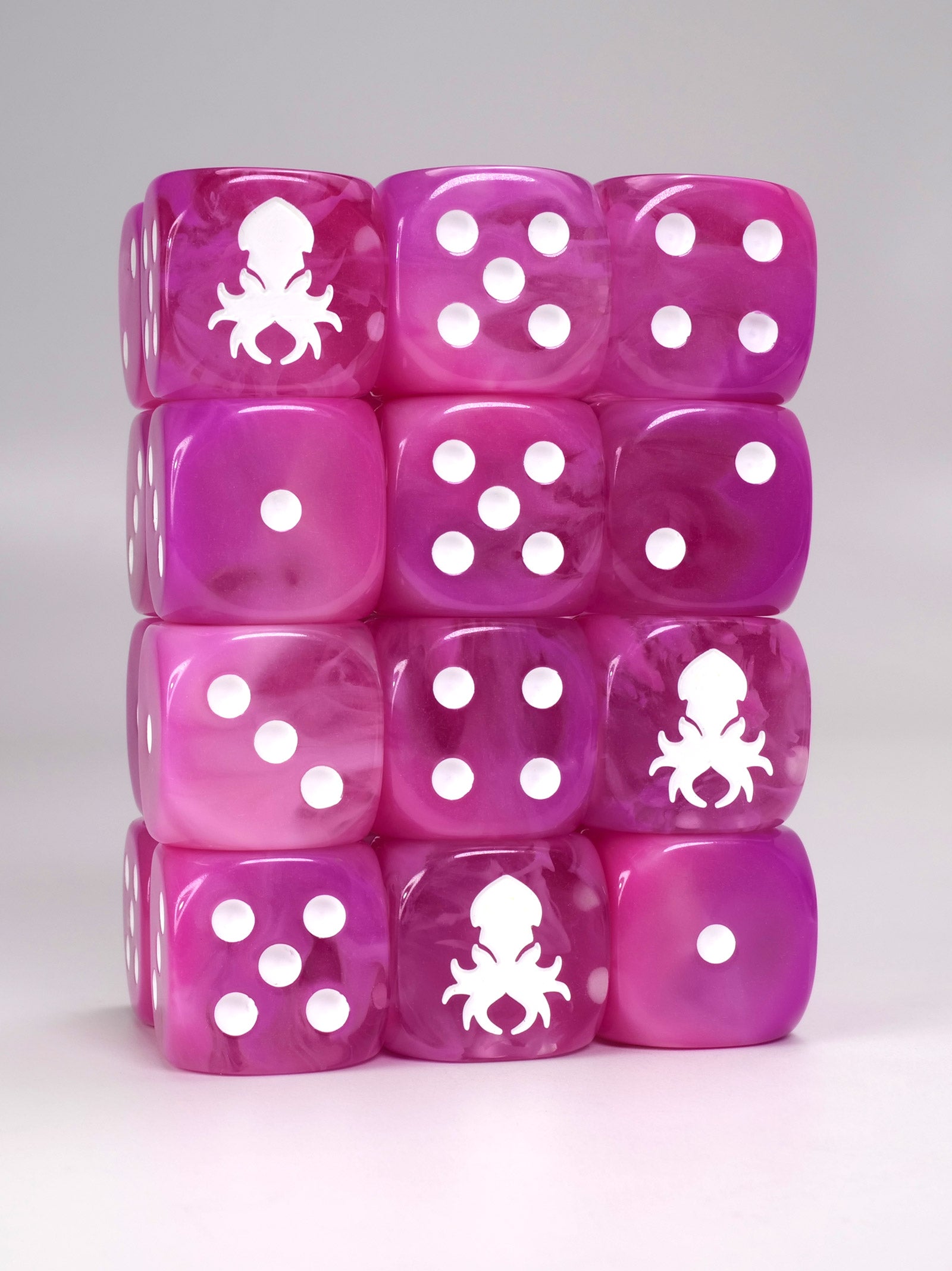 Pink dice d6 pips with rounded corners with white Kraken Dice logo Wargaming Resin Dice for War hammer type war games.