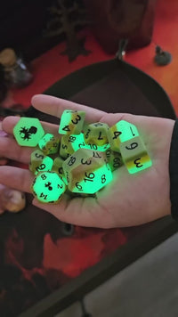 Papaya Glow in the Dark 14pc Dice Set inked in Black