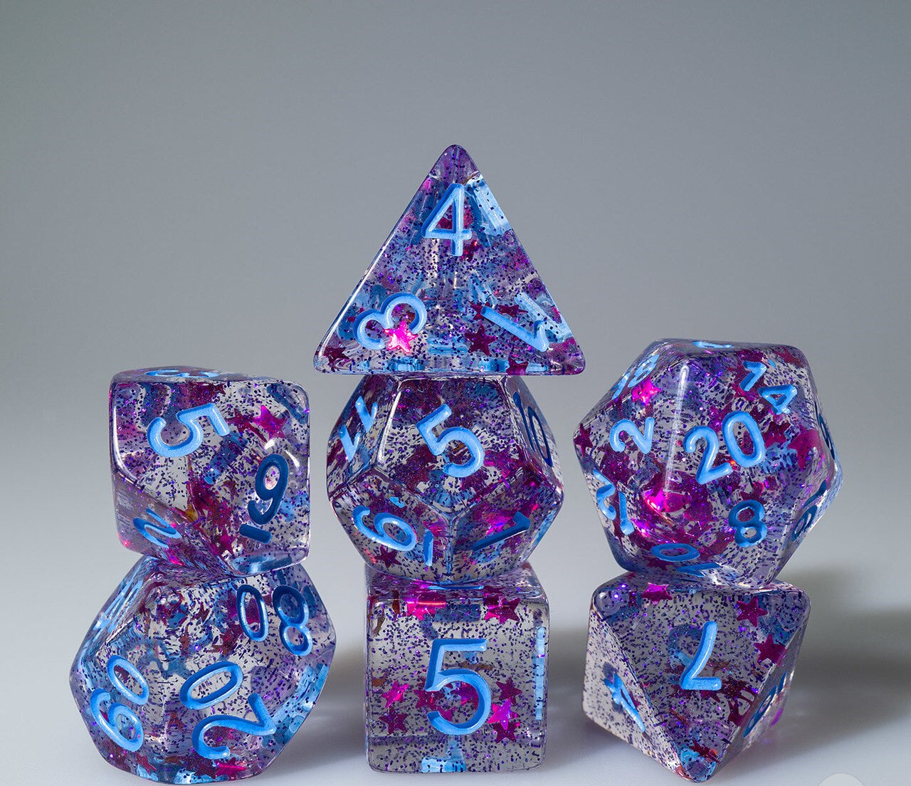 Magenta Glitter and Purple Stars with Blue Ink 7pc Polyhedral Dice Set