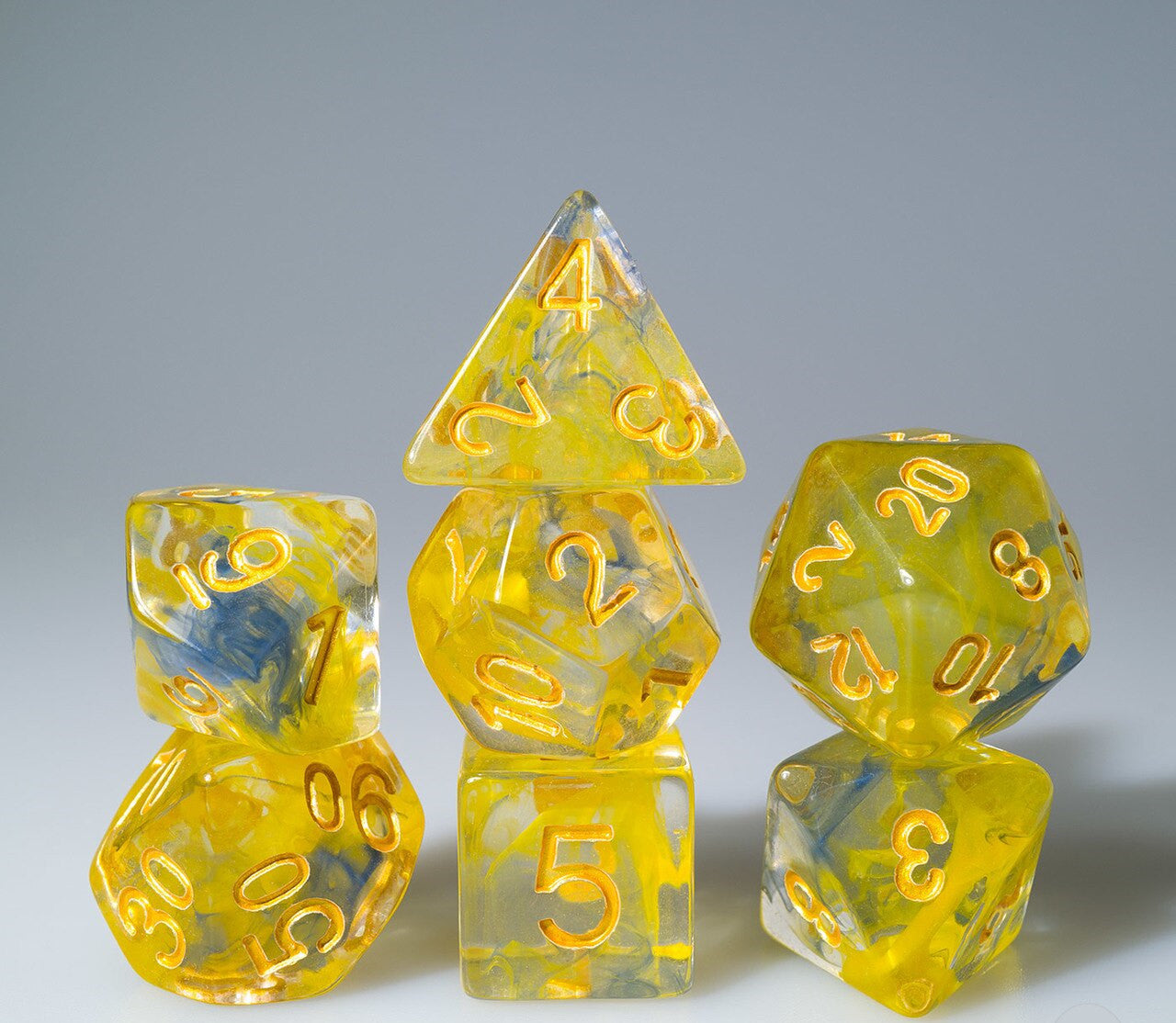 Yellow and Blue Swirl with Gold Ink 7pc Polyhedral Dice Set