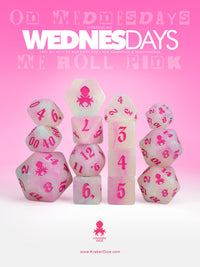 Wednesdays 14pc Glow in the Dark Dice Set with Pink Ink